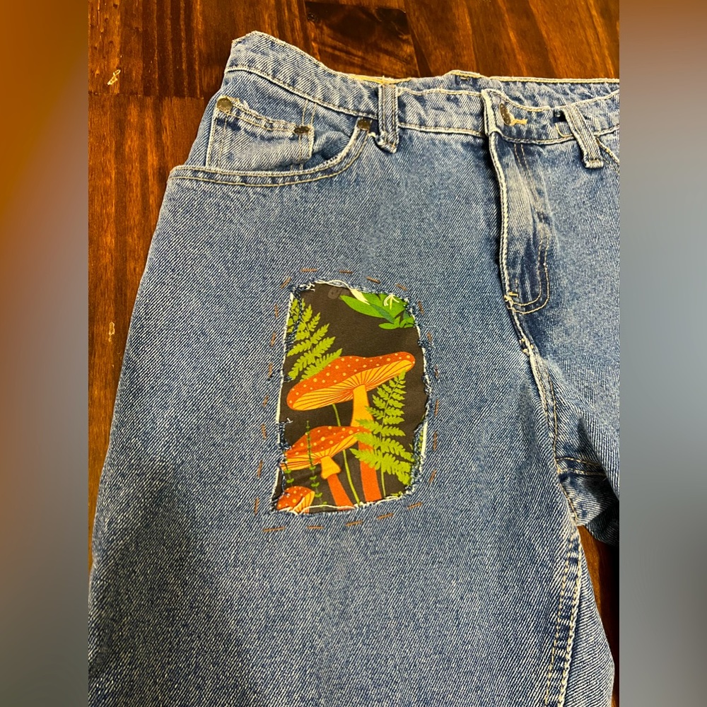 Funky mushroom and plaid vintage patch jeans